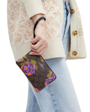 Load image into Gallery viewer, Coach corner zip wristlet in signature canvas With Rose Print
